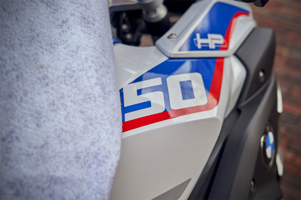 Waterproof DS Alfa outdoor motorcycle cover protecting a bike from rain and weather_3