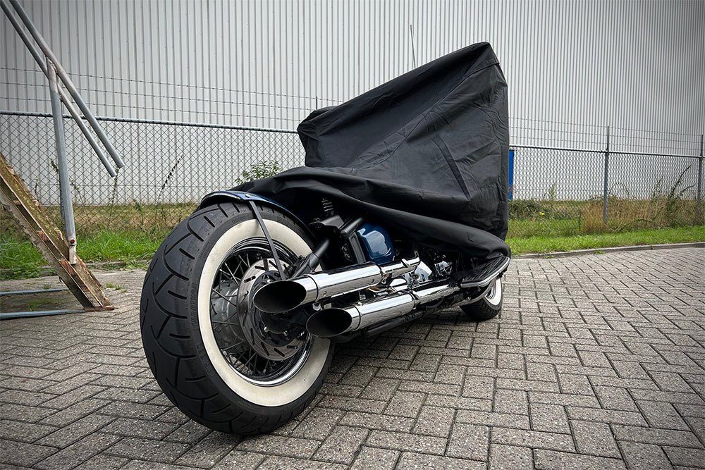 Waterproof DS Alfa outdoor motorcycle cover protecting a bike from rain and weather_7