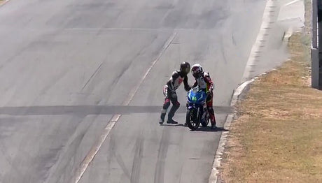 Riders fight during motorbike race - Motorcycle Performance Store
