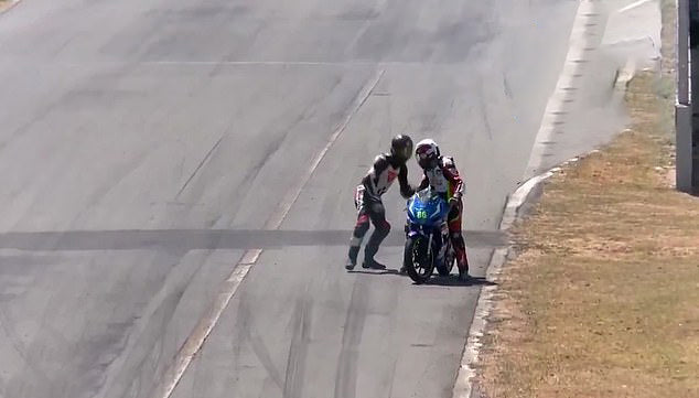 Riders fight during motorbike race