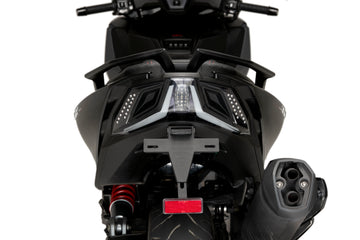 Puig tail tidy fitted to Kymco AK550 Premium showing compact rear licence plate mount_1