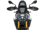 Puig 23209W Clear Headlight Protector BMW F450GS 2026, scratch-resistant polycarbonate motorcycle headlight guard with UV protection, black epoxy-coated steel mounting brackets and fitting kit_1