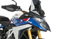 Puig 23209W Clear Headlight Protector BMW F450GS 2026, scratch-resistant polycarbonate motorcycle headlight guard with UV protection, black epoxy-coated steel mounting brackets and fitting kit.