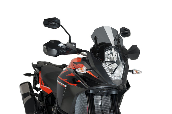 Puig New Generation dark smoke sport screen installed on a KTM 1190 Adventure 2013–2016