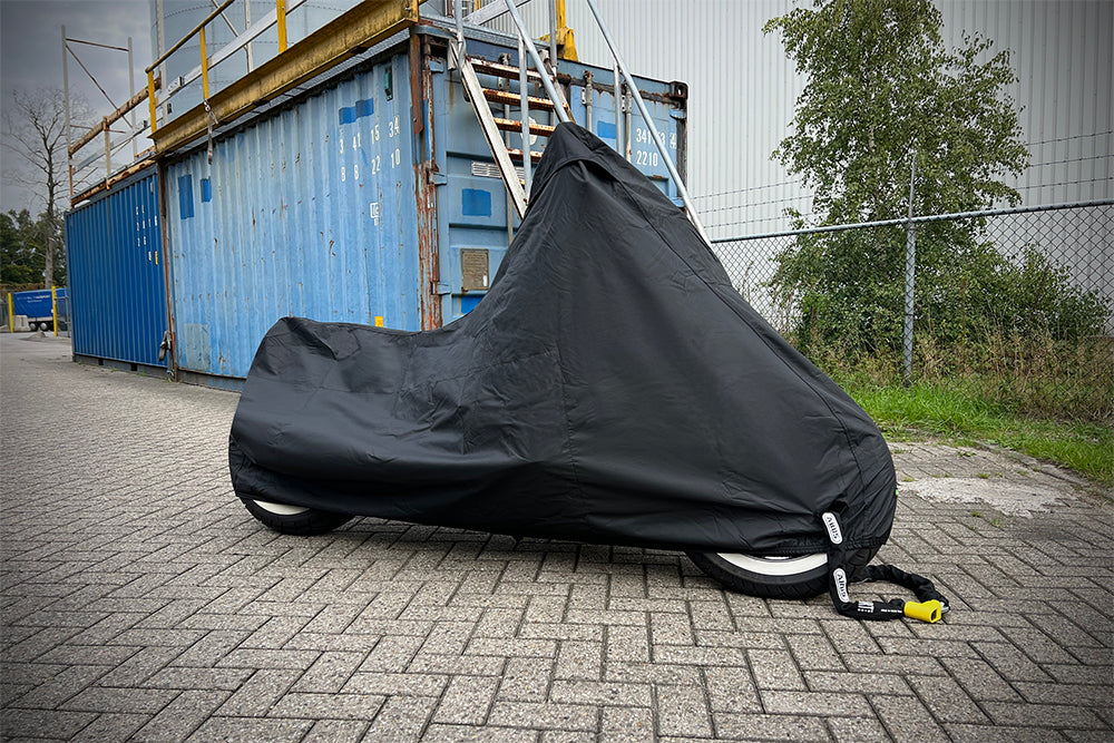 Waterproof DS Alfa outdoor motorcycle cover protecting a bike from rain and weather_5