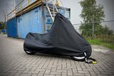 Waterproof DS Alfa outdoor motorcycle cover protecting a bike from rain and weather_5