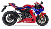 Ixrace MK2 black MotoGP style silencer fitted to Honda CBR1000RR-R 2020-2026 with carbon fibre heat shield