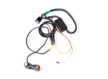 QD X-DB electronic exhaust sound controller with five-stage exhaust valve adjustment, handlebar switch panel, electronic management interface and motorcycle-specific wiring for Aprilia models