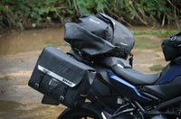 SHAD SW42 waterproof side bags 25L per bag. Durable adventure panniers with IPX5 protection, reflective details and secure mounting options.